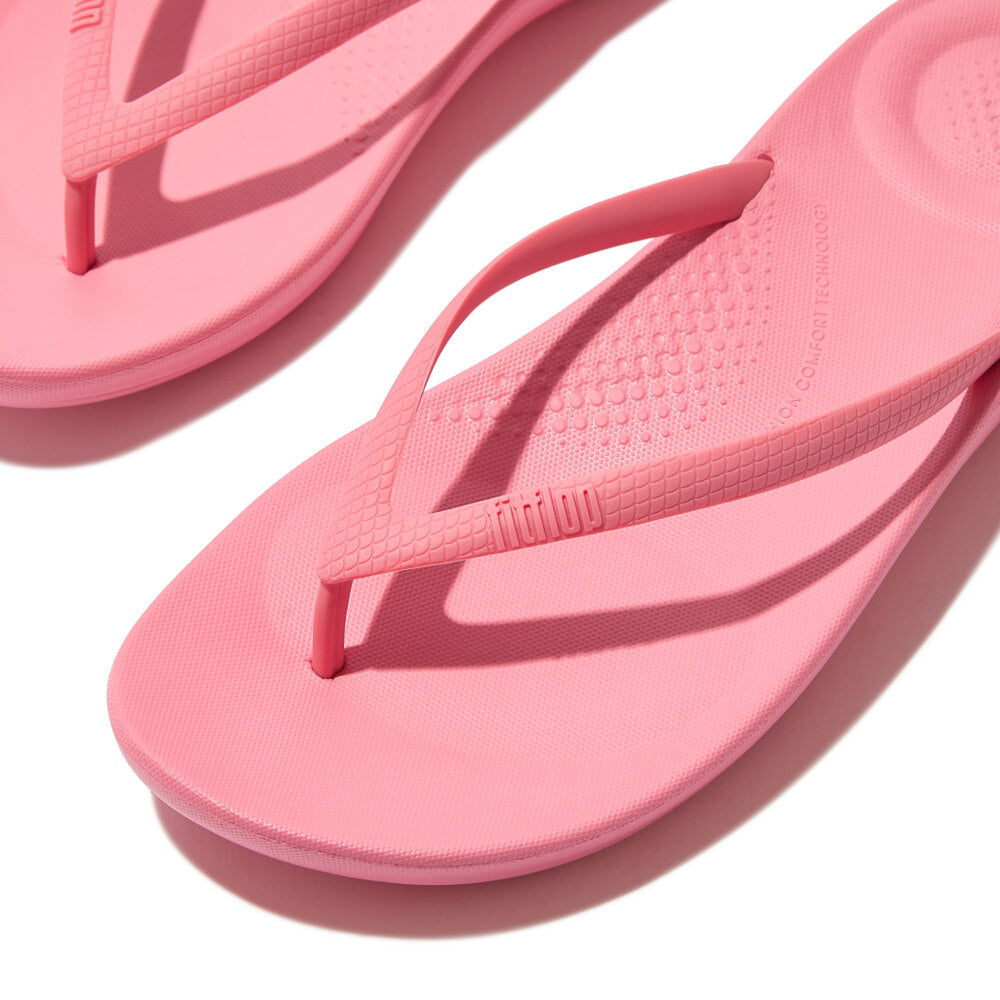 FitFlop IQUSHION ERGONOMIC Womens Flip Flops Geranium Pink close-up detail view of flip flops with rubber straps.