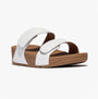 FitFlop LULU ADJUSTABLE Womens Slides Urban White side view showcasing leather upper and rubber sole.