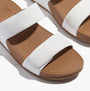 FitFlop LULU ADJUSTABLE Womens Slides Urban White top view showcasing the leather upper and rubber sole.