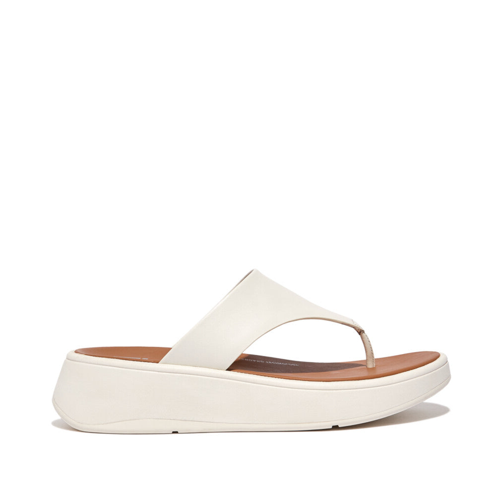 FitFlop F-MODE LEATHER FLATFORM Womens Toe Post Sandals Cream side view showing leather upper and rubber sole.