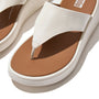 FitFlop F-MODE LEATHER FLATFORM Womens Toe Post Sandals Cream detail view of toe post and cushioned sole.