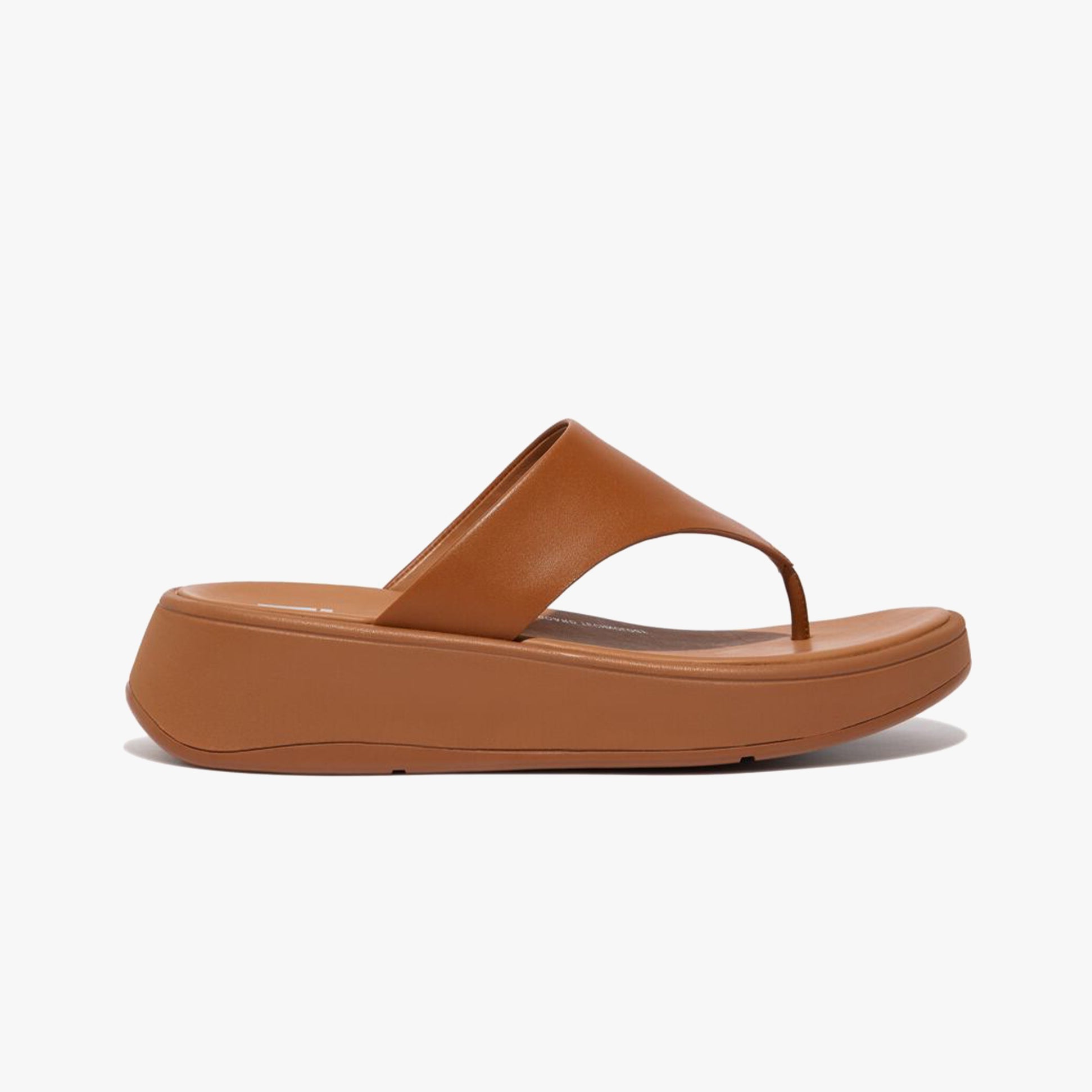 FitFlop F-MODE LEATHER FLATFORM Womens Toe Post Sandals Light Tan side view showing leather upper and platform sole.