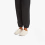 FitFlop SHUV e01 Womens Clog Slippers Ivory side view worn with black joggers