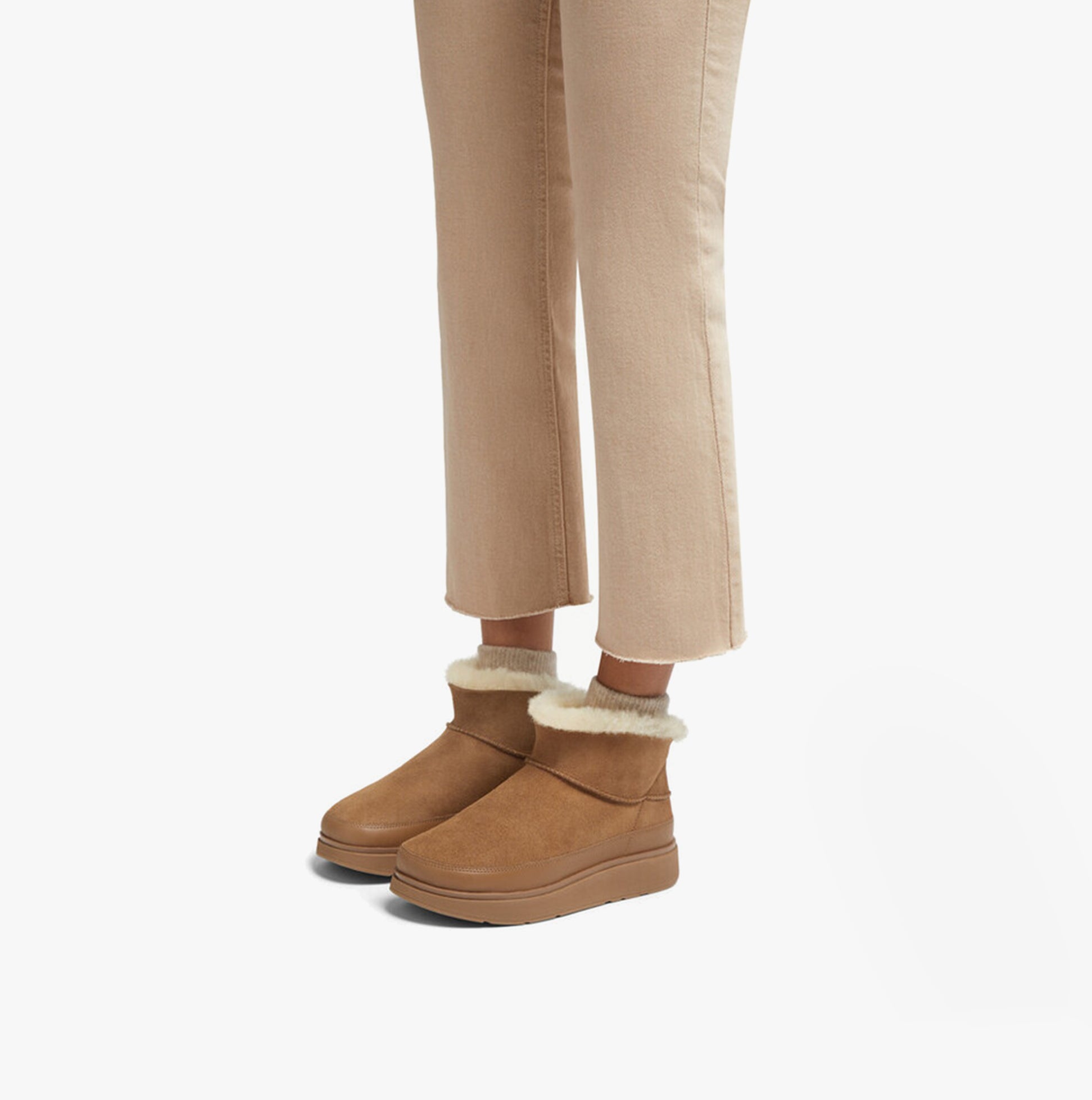 FitFlop GEN-FF ULTRA-MINI Womens Boots Desert Tan side view on model wearing beige pants.