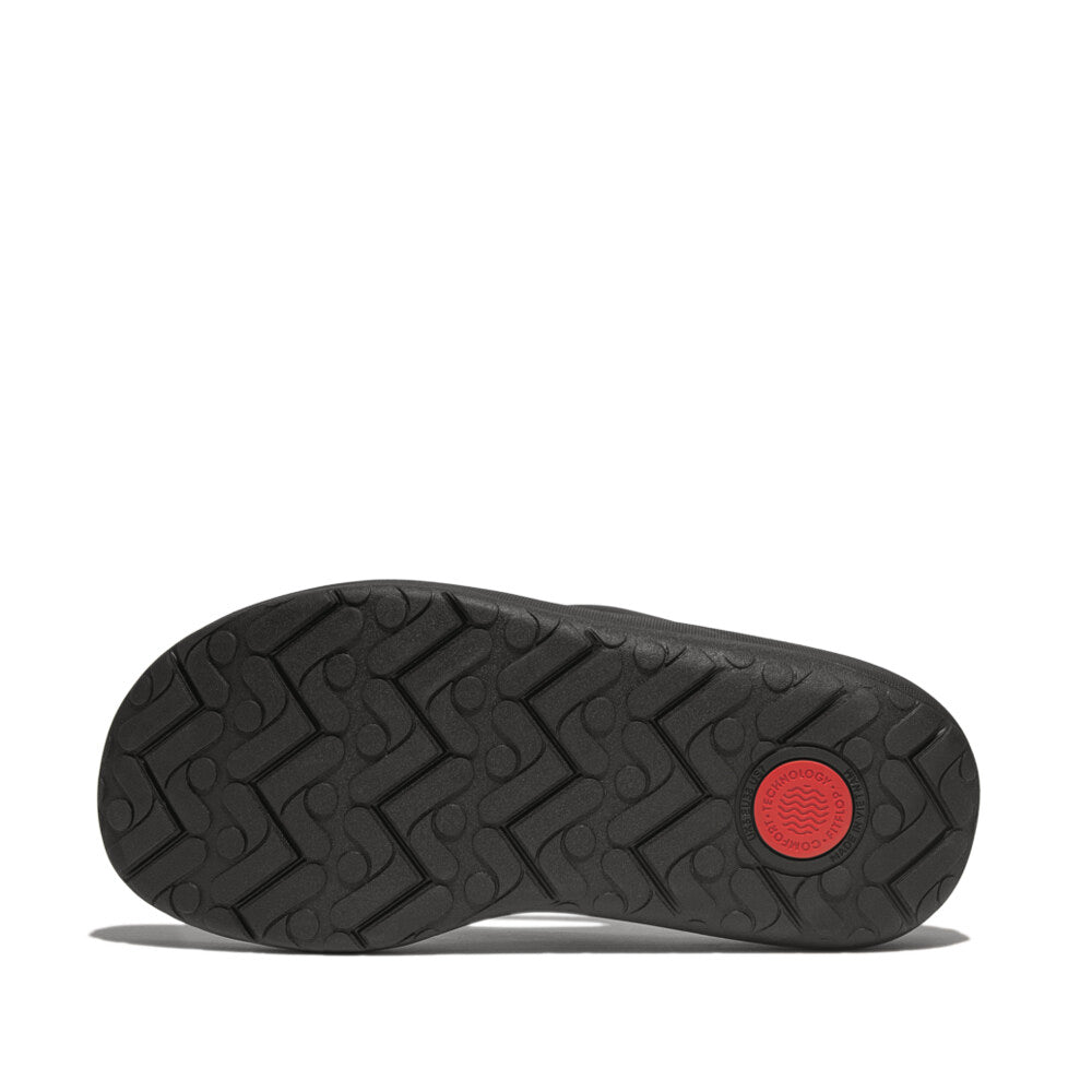 FitFlop RELIEFF RECOVERY Womens Toe Post Sandals Black sole view with unique tread and red accent.