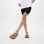FitFlop RELIEFF RECOVERY Womens Toe Post Sandals Camo-Green side view on model with black shorts