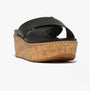 FitFlop ELOISE LEATHER Womens Cross Slides Black side view showing wedge heel and cork sole.