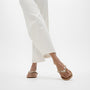 FitFlop GRACIE JEWEL-DELUXE Womens Flip Flops Silver side view worn with white pants