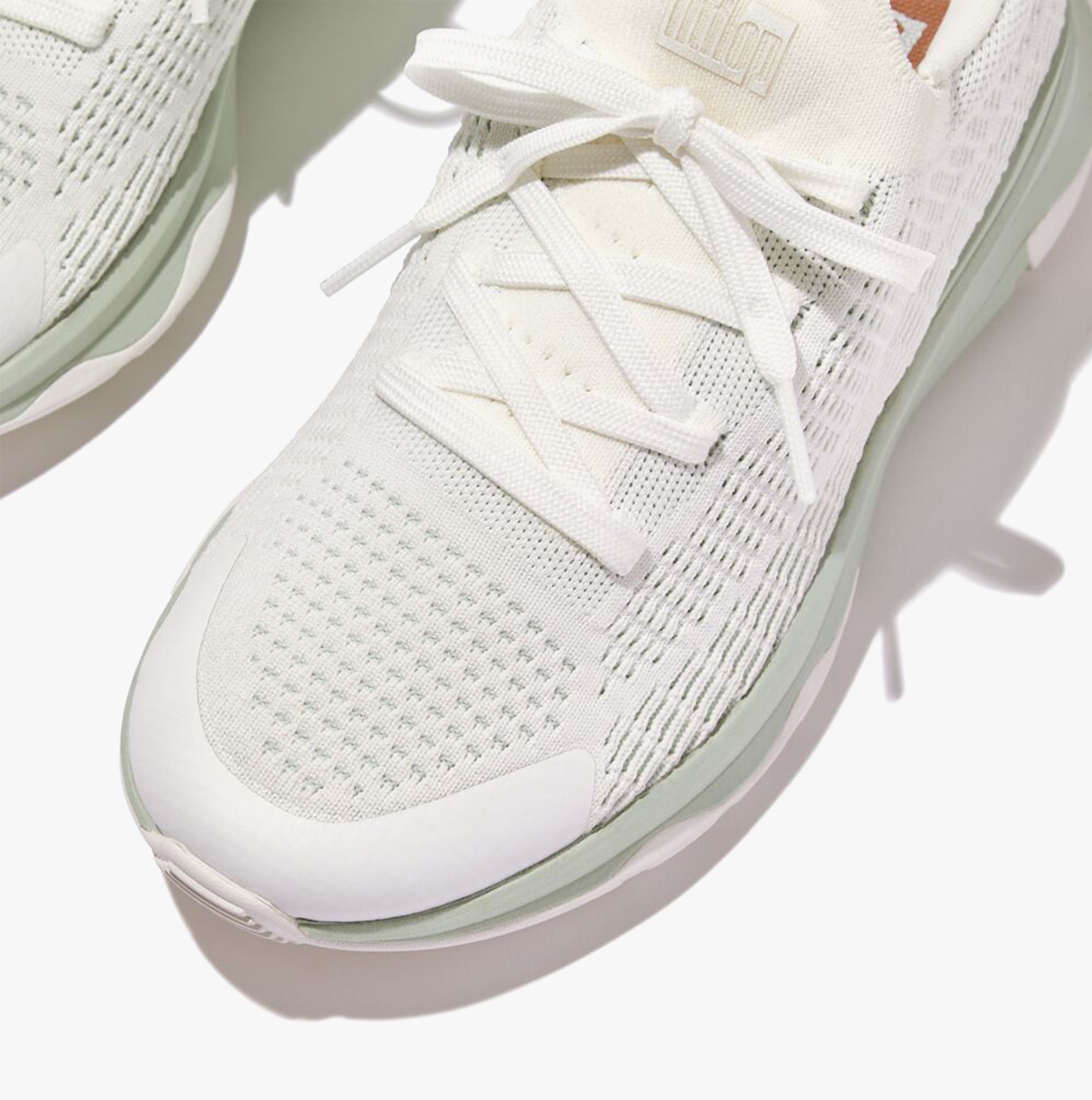 FitFlop VITAMIN FFX KNIT Womens Trainers Urban White/Sagebrush close-up view of shoe upper and laces.
