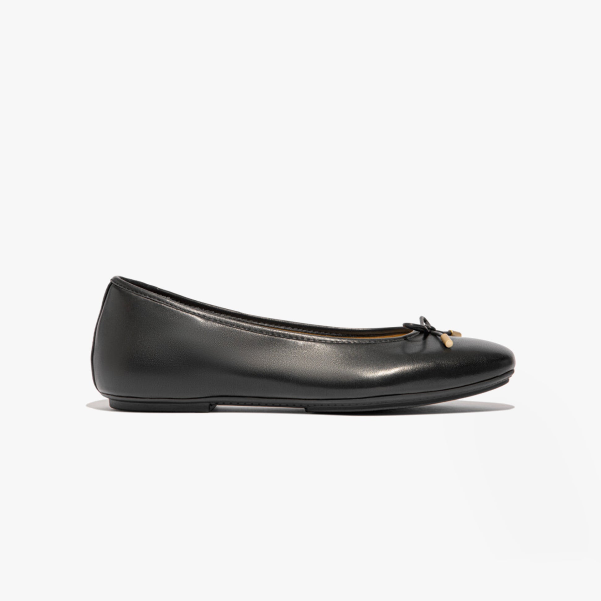 FitFlop DELICATO BOW Womens Ballet Flats Black side view showcasing sleek leather design and bow detail.