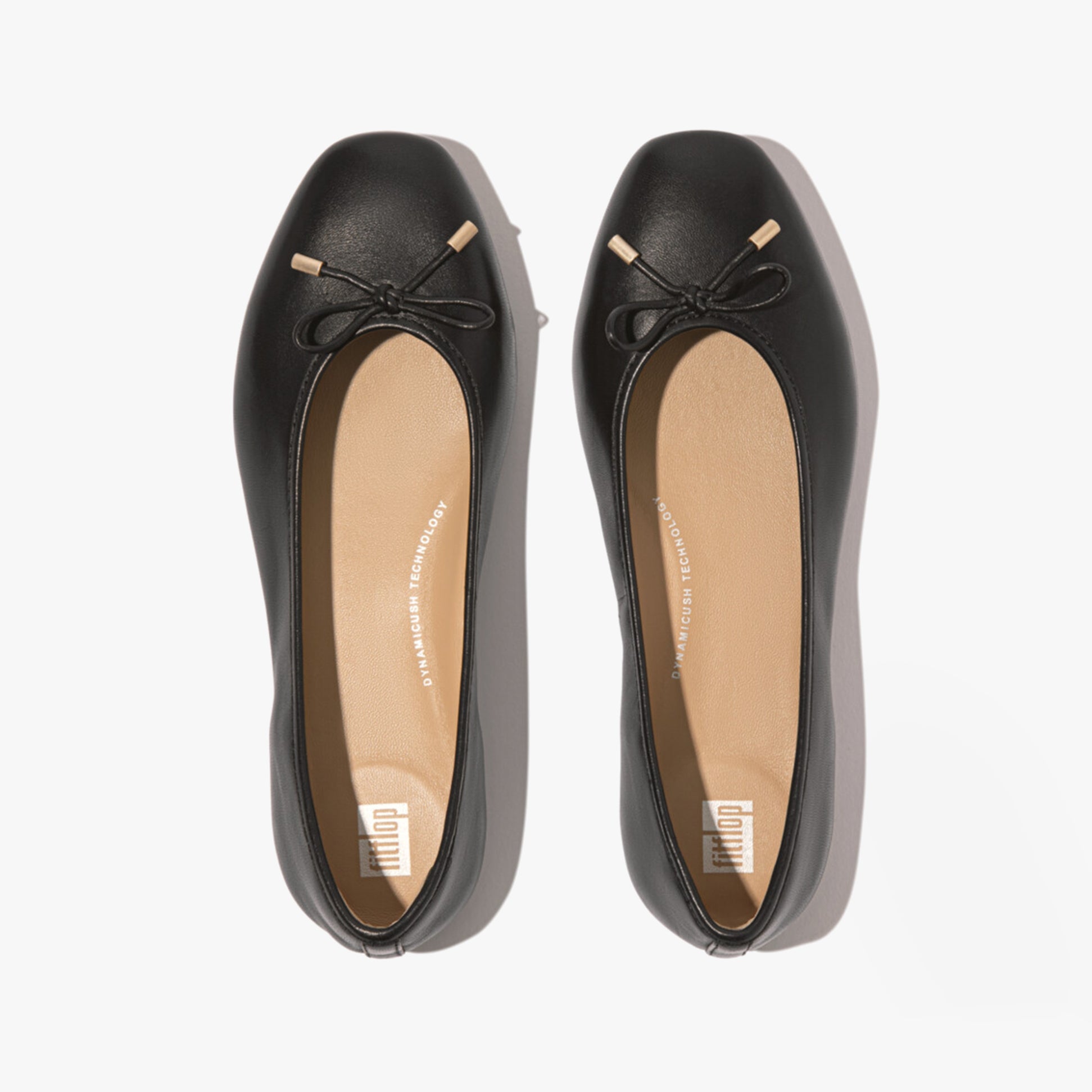 FitFlop DELICATO BOW Womens Ballet Flats Black top view showing leather upper and bow detail.