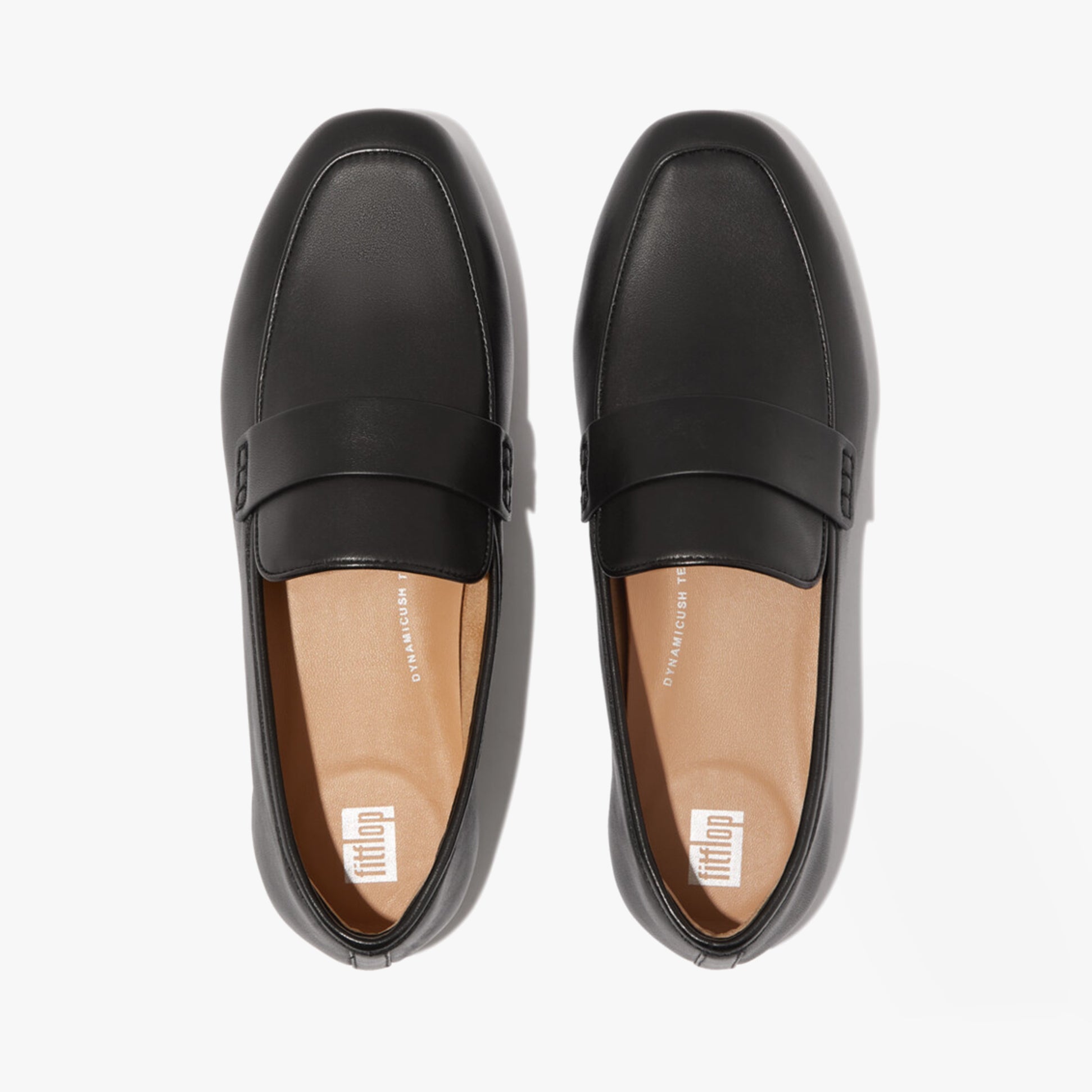 FitFlop DELICATO SOFT Womens Loafers Black top view showcasing leather upper and slip-on design.