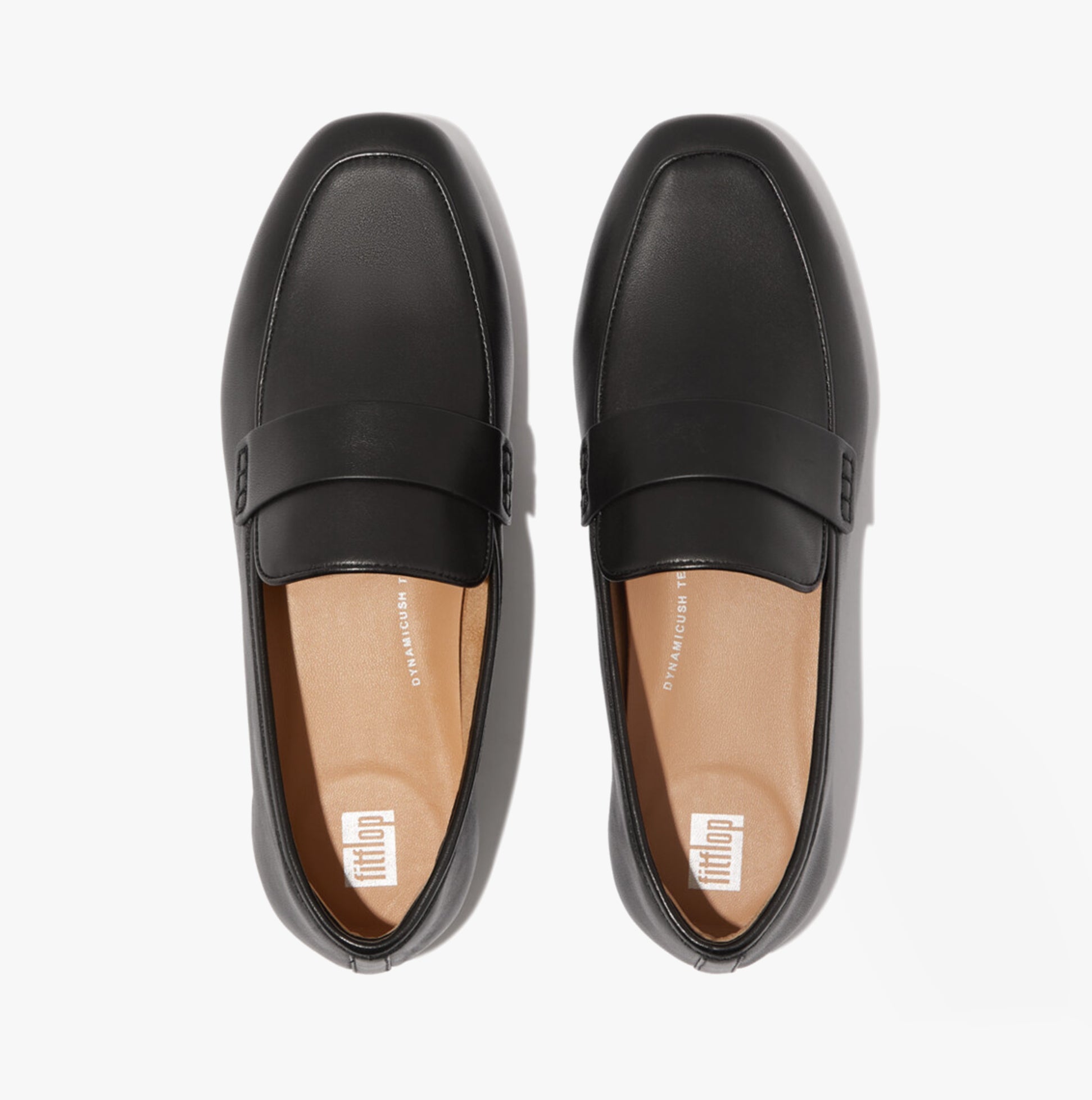 FitFlop DELICATO SOFT Womens Loafers Black top view showcasing leather upper and slip-on design.