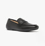 FitFlop DELICATO SOFT Womens Loafers Black side view showing leather upper and slip-on design.