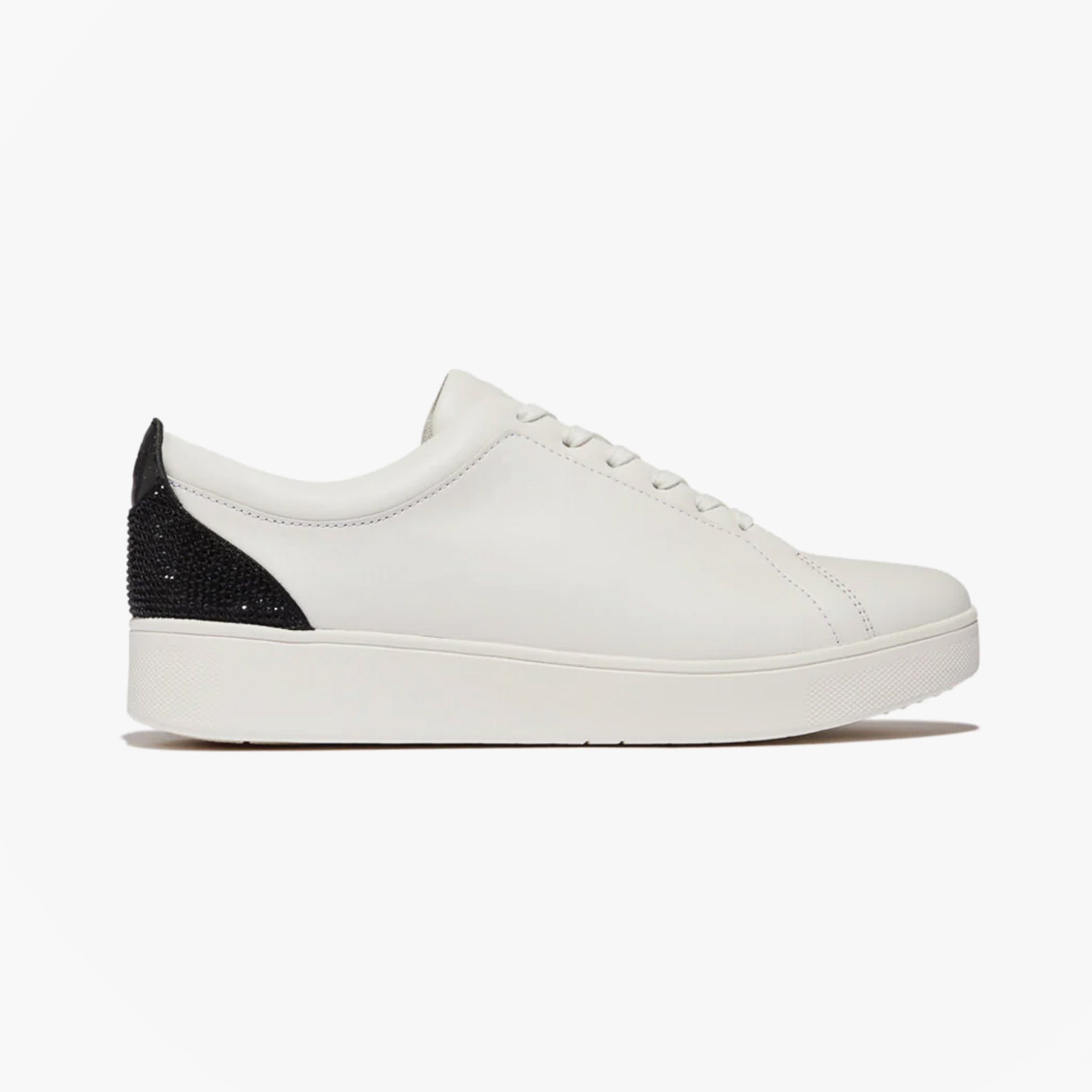 FitFlop RALLY CRYSTAL-BACKTAB Womens Trainers Black side view showcasing sleek design with crystal backtab detail.