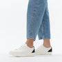FitFlop RALLY CRYSTAL-BACKTAB Womens Trainers Black side view worn with blue jeans
