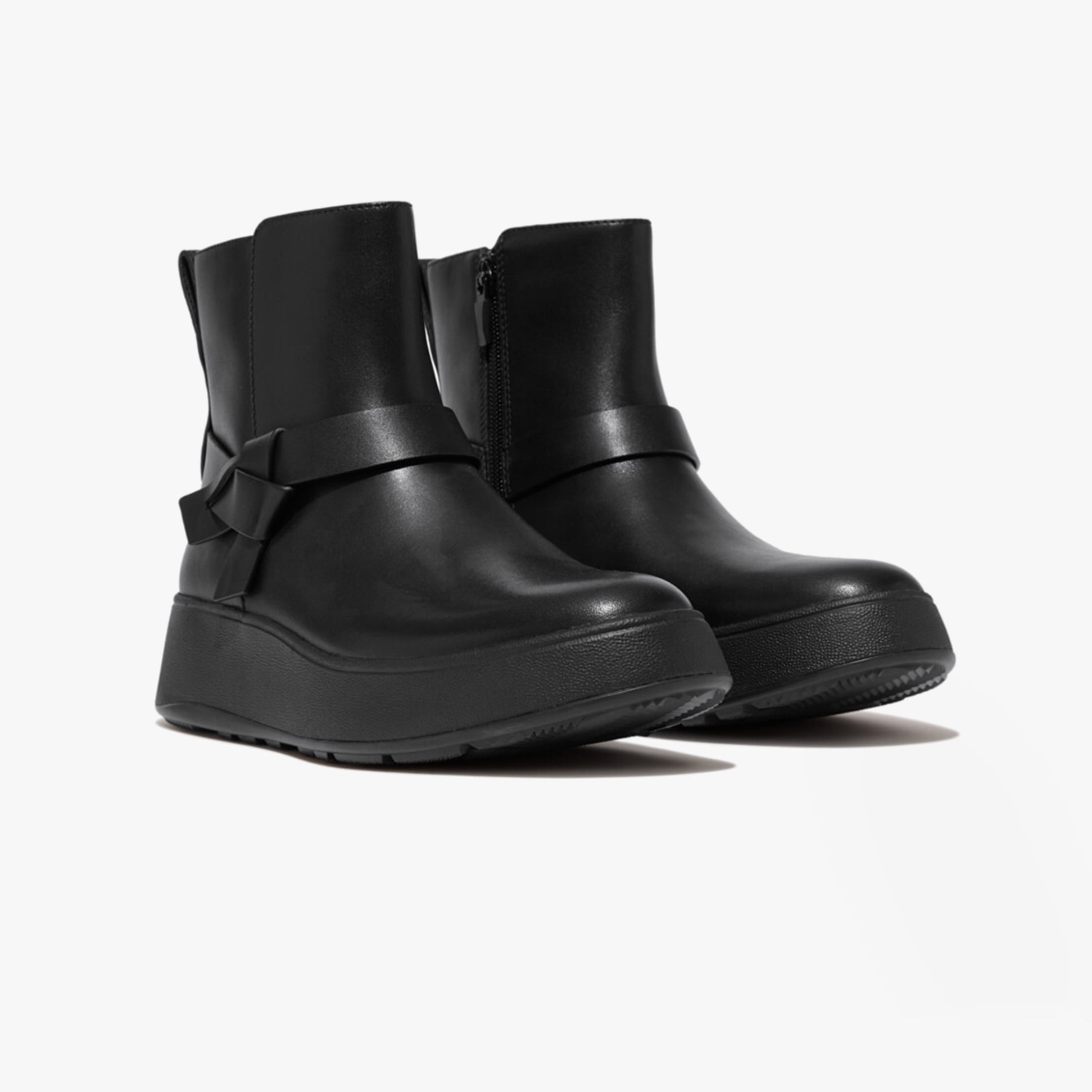 FitFlop F-MODE FOLDED-KNOT Womens Chelsea Boots Black side view showcasing leather upper and platform sole.