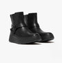 FitFlop F-MODE FOLDED-KNOT Womens Chelsea Boots Black side view showcasing leather upper and platform sole.