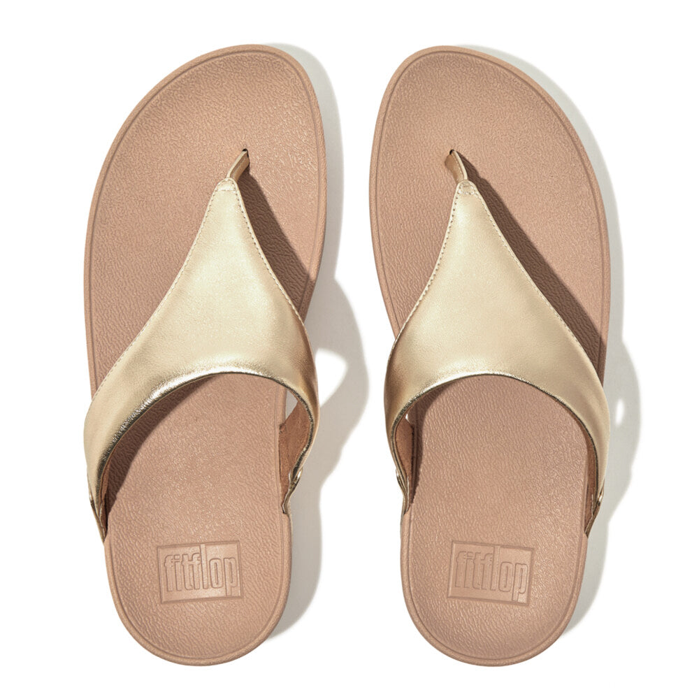 FitFlop LULU LEATHER Womens Toe Post Sandals Platino top view, showcasing the gold leather upper and slip-on design.