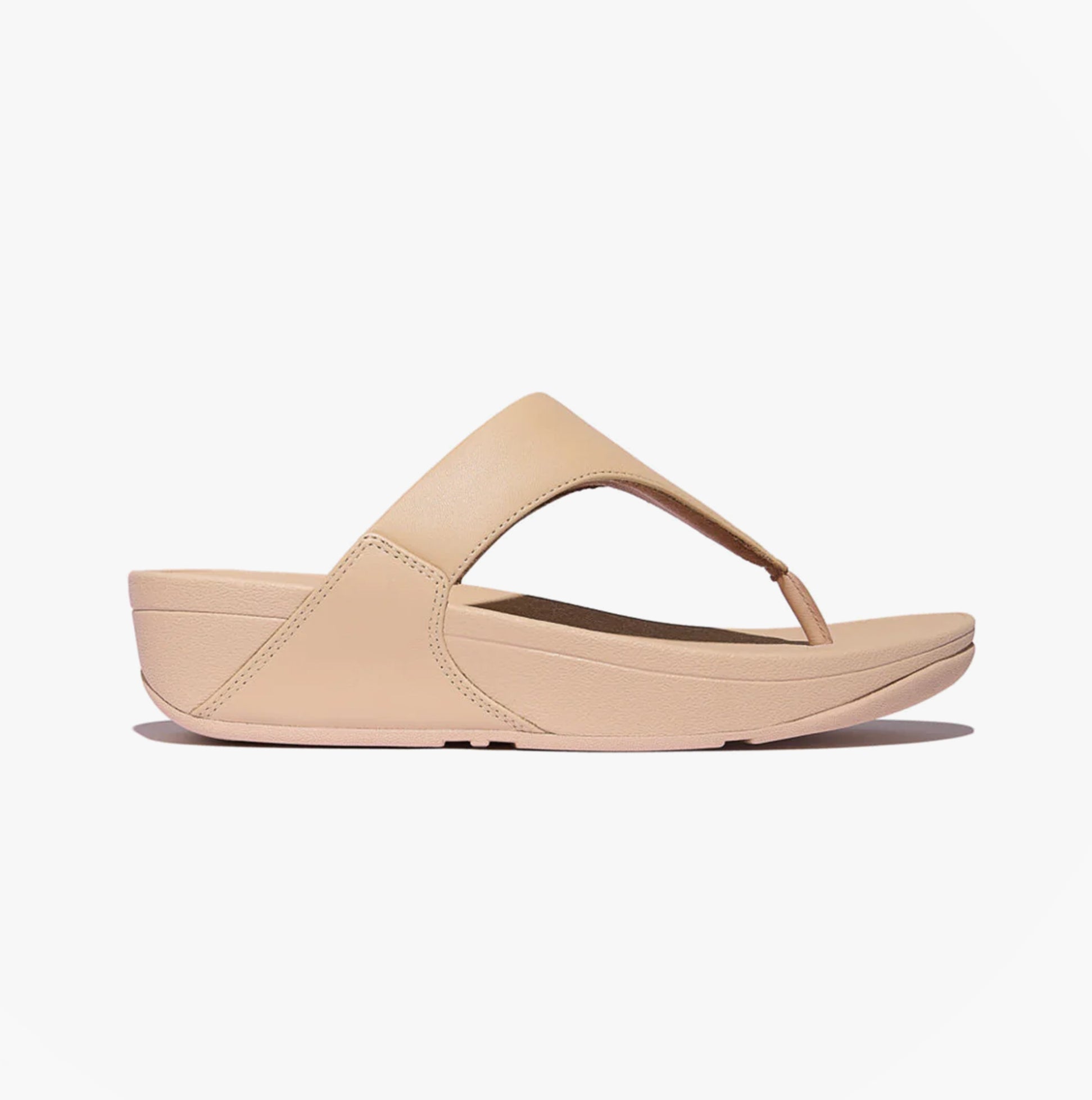 FitFlop LULU LEATHER Womens Toe Post Sandals Sandy Beige side view showing smooth leather design and platform heel.