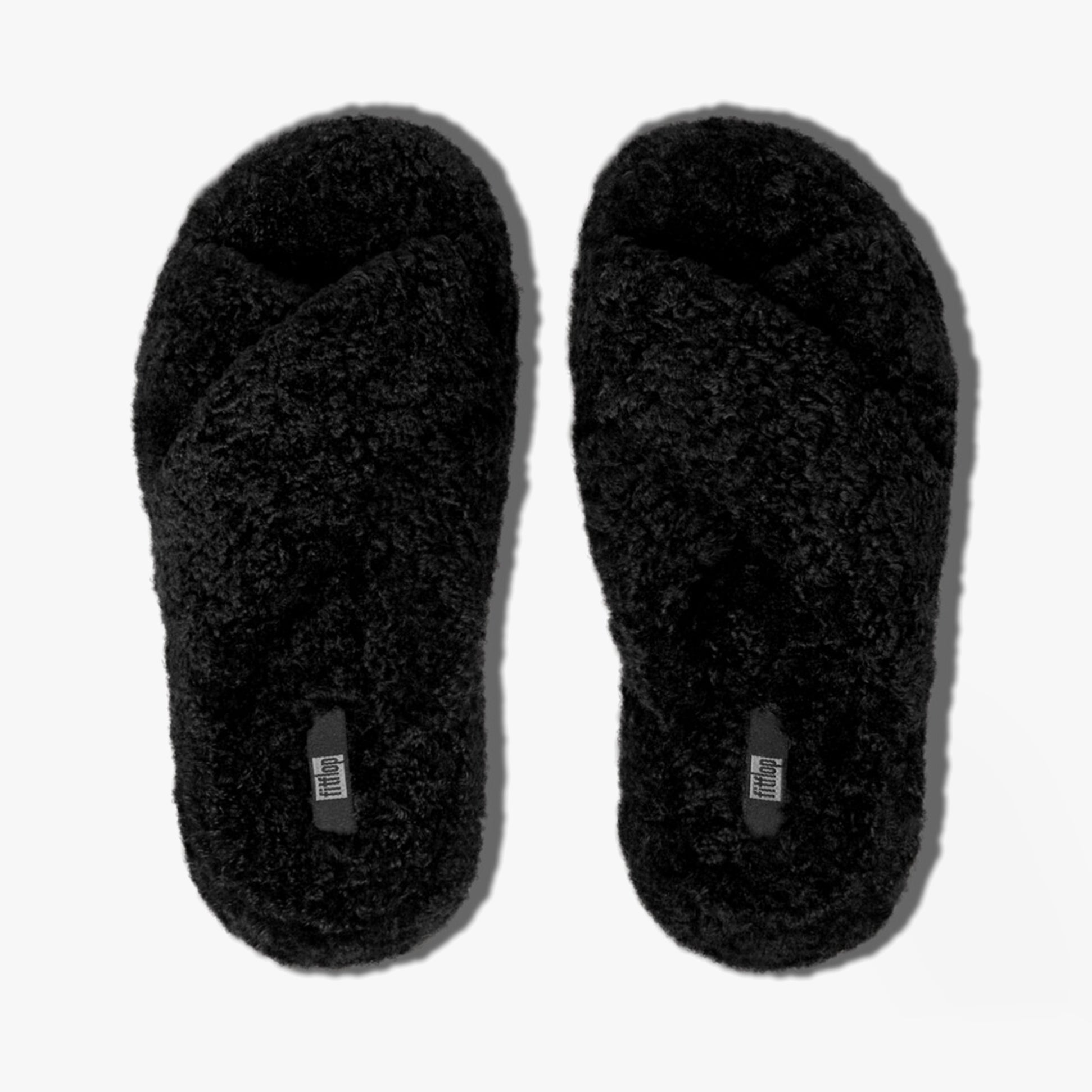 FitFlop iQUSHION D-LUXE Womens Cross Slides All Black top view featuring soft, plush upper and cross slip-on design.