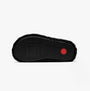 FitFlop iQUSHION D-LUXE Womens Cross Slides All Black bottom view outsole with textured rubber and logo detail