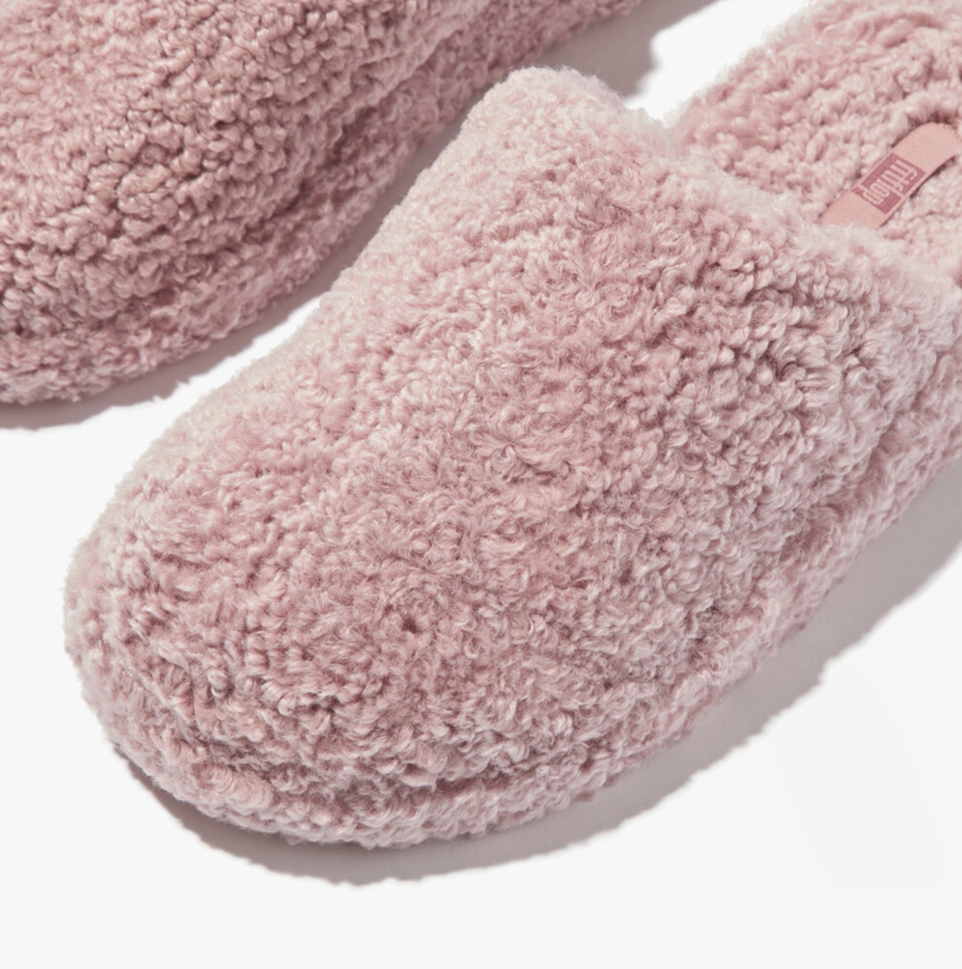 FitFlop iQUSHION D-LUXE Womens Mule Slippers Dusky Pink top view showing soft, textured upper material.