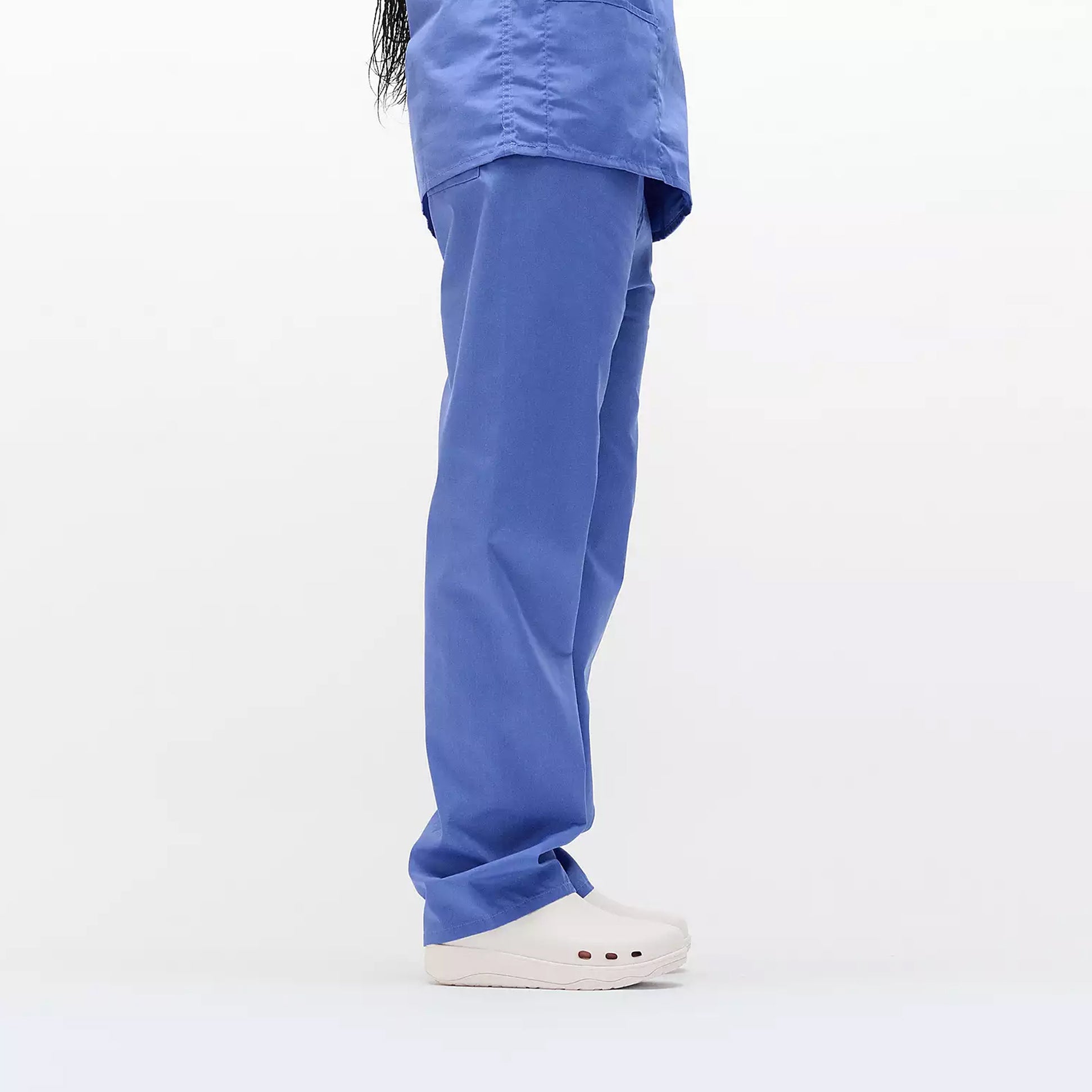 FitFlop WORK HIGH-PERFORMACE Womens Clogs Urban White side view worn with blue scrubs