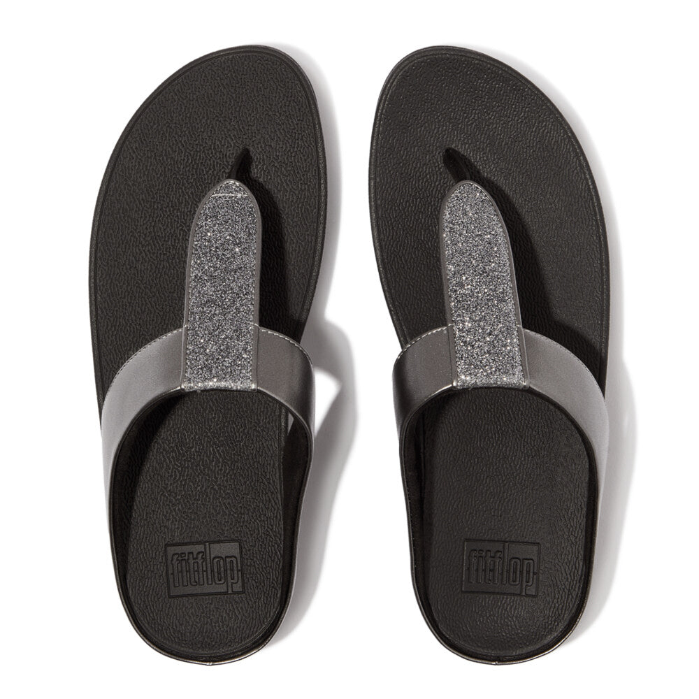 FitFlop FINO GLITTERDUST METALLIC Womens Toe Post Sandals Pewter top view showcasing glittery metallic straps and black sole.