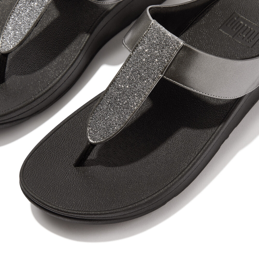 FitFlop FINO GLITTERDUST METALLIC Womens Toe Post Sandals Pewter detail view showcasing glitter strap and slip-resistant sole.