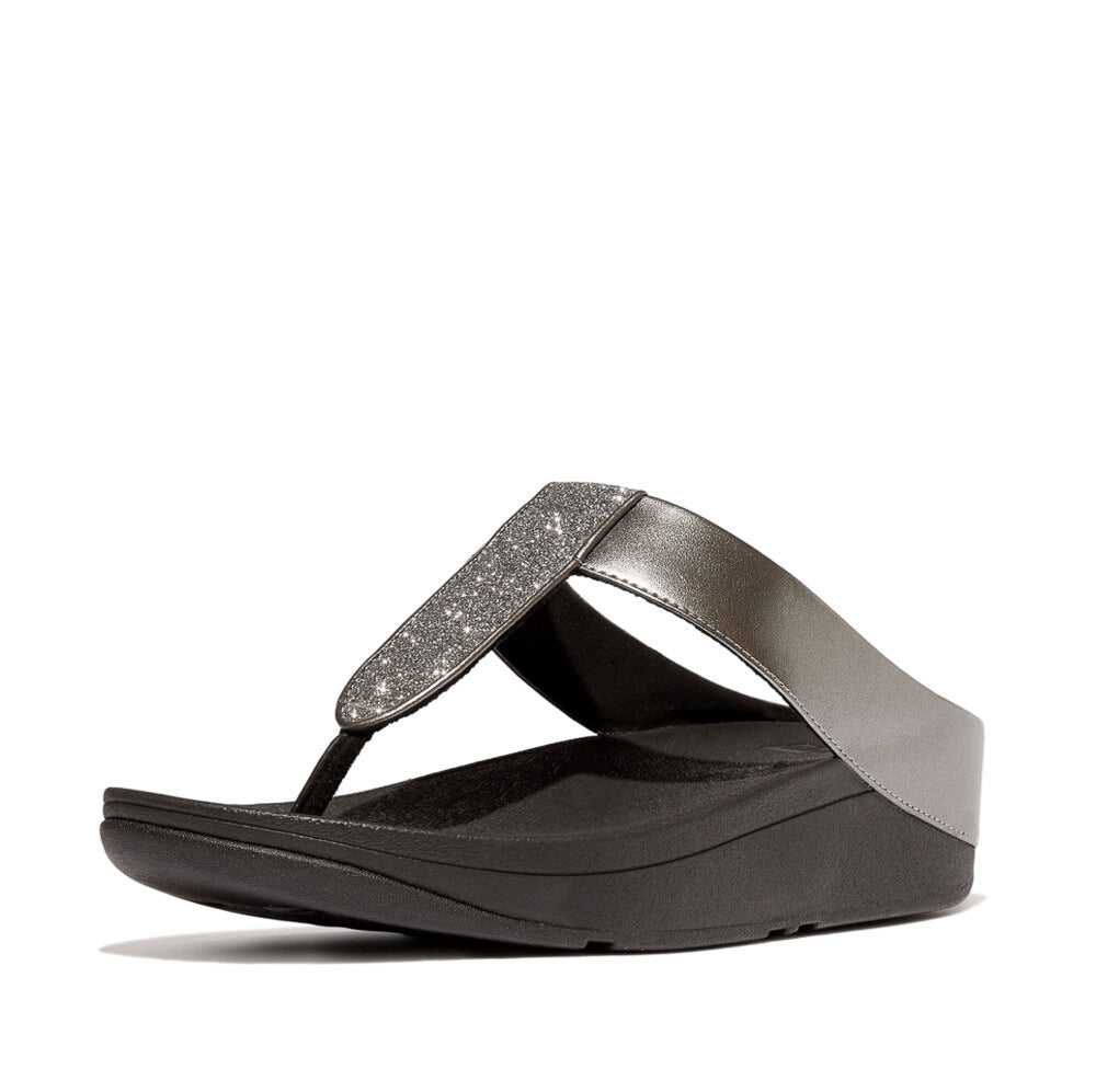 FitFlop FINO GLITTERDUST METALLIC Womens Toe Post Sandals Pewter side view showcasing glittery strap and comfortable sole.
