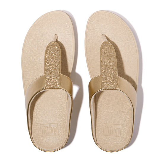 FitFlop FINO GLITTERDUST METALLIC Womens Toe Post Sandals Platino top view showcasing slip-on design and glitter accent.
