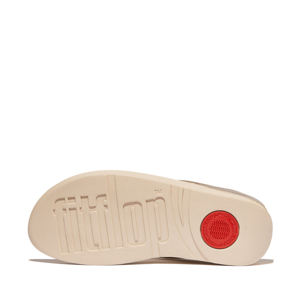 FitFlop FINO GLITTERDUST METALLIC Womens Toe Post Sandals Platino bottom view showcasing rubber sole with red detail.
