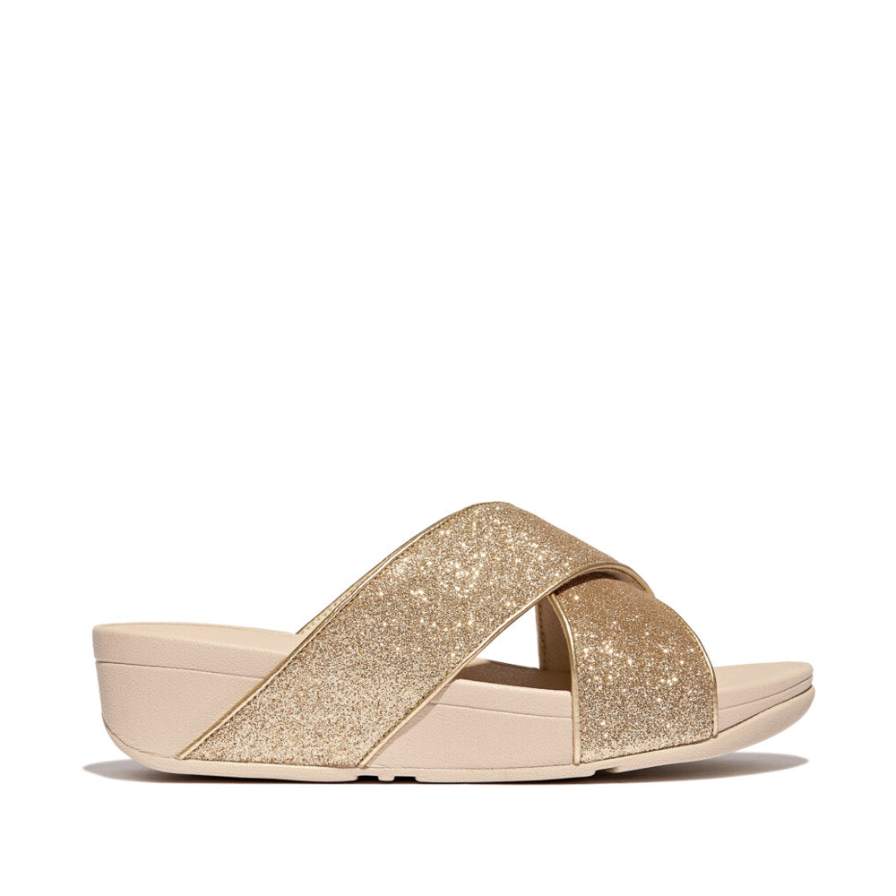 FitFlop LULU GLITTERDUST Womens Slides Platino side view showing wedge heel and glitter detailing.