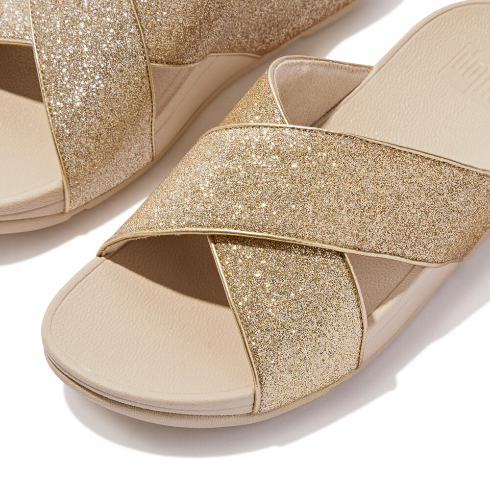FitFlop LULU GLITTERDUST Womens Slides Platino detail view of glittery gold straps and soft footbed.