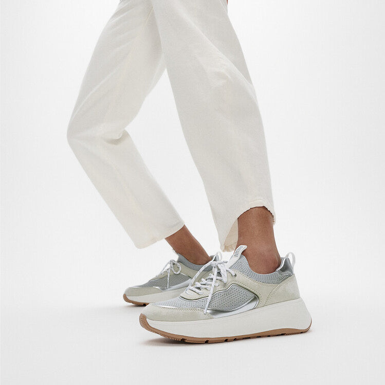 FitFlop F-MODE SUEDE/KNIT Womens Trainers Urban White/French Grey side view worn with casual pants.