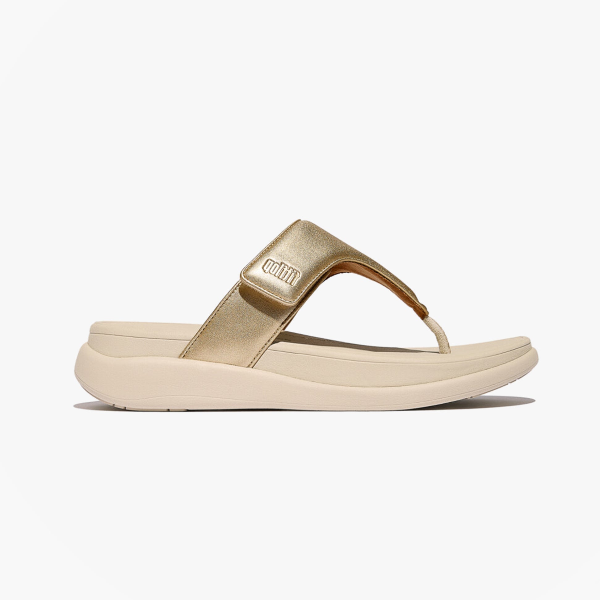 FitFlop F-MODE GO Womens Toe Post Sandals Platino side view showing gold leather upper and comfortable rubber sole.