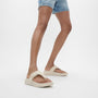 FitFlop F-MODE GO Womens Toe Post Sandals Paris Beige side view on model wearing denim shorts