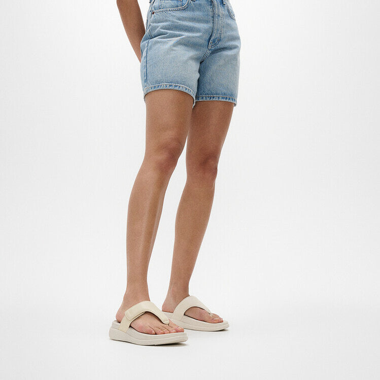 FitFlop F-MODE GO Womens Toe Post Sandals Paris Beige side view worn with denim shorts