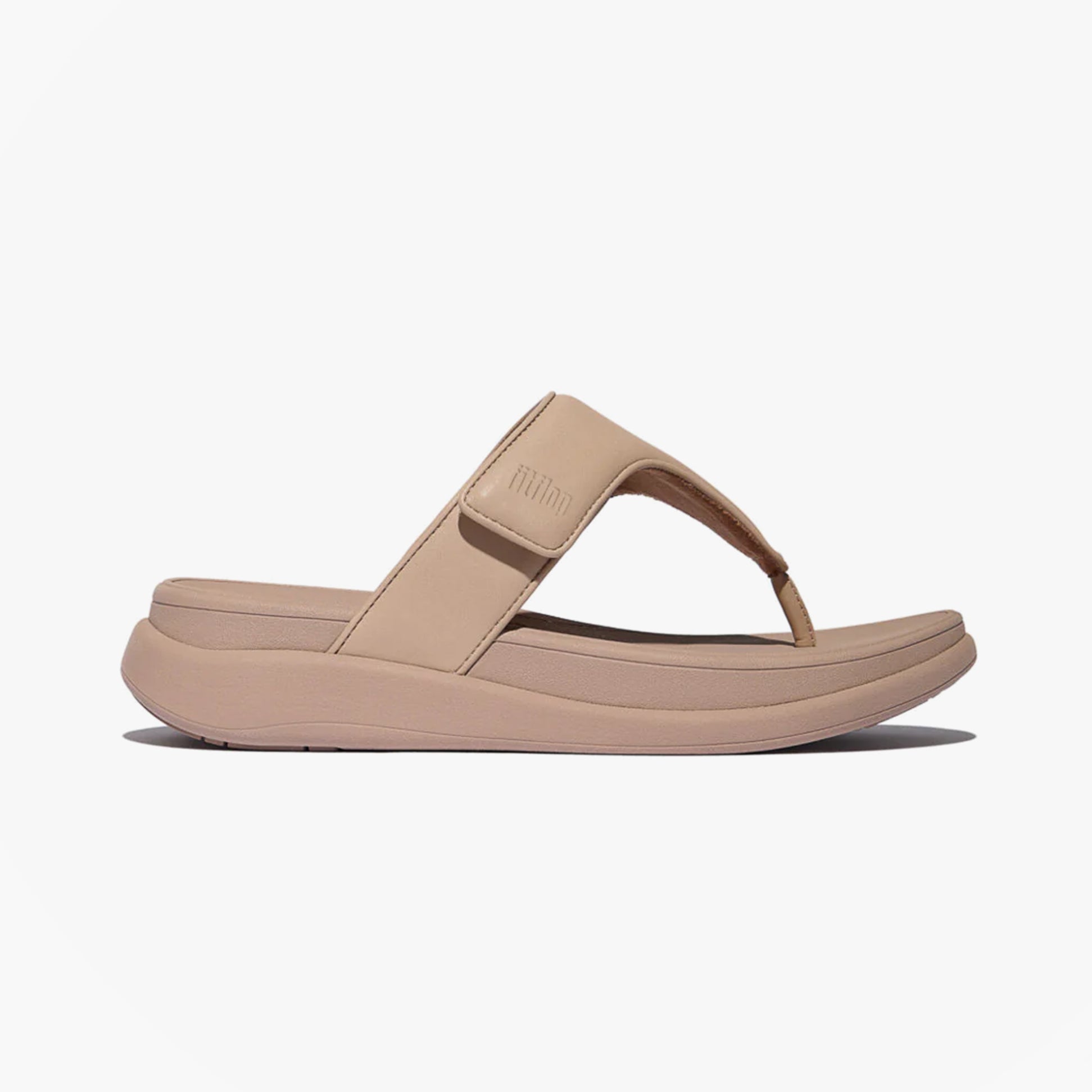 FitFlop F-MODE GO Womens Toe Post Sandals Classic Beige side view showcasing the leather upper and slip-on design.