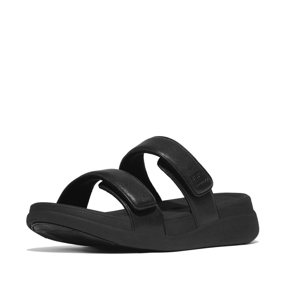 FitFlop F-MODE GO Womens Slides All Black side view showcasing leather upper and EVA sole.