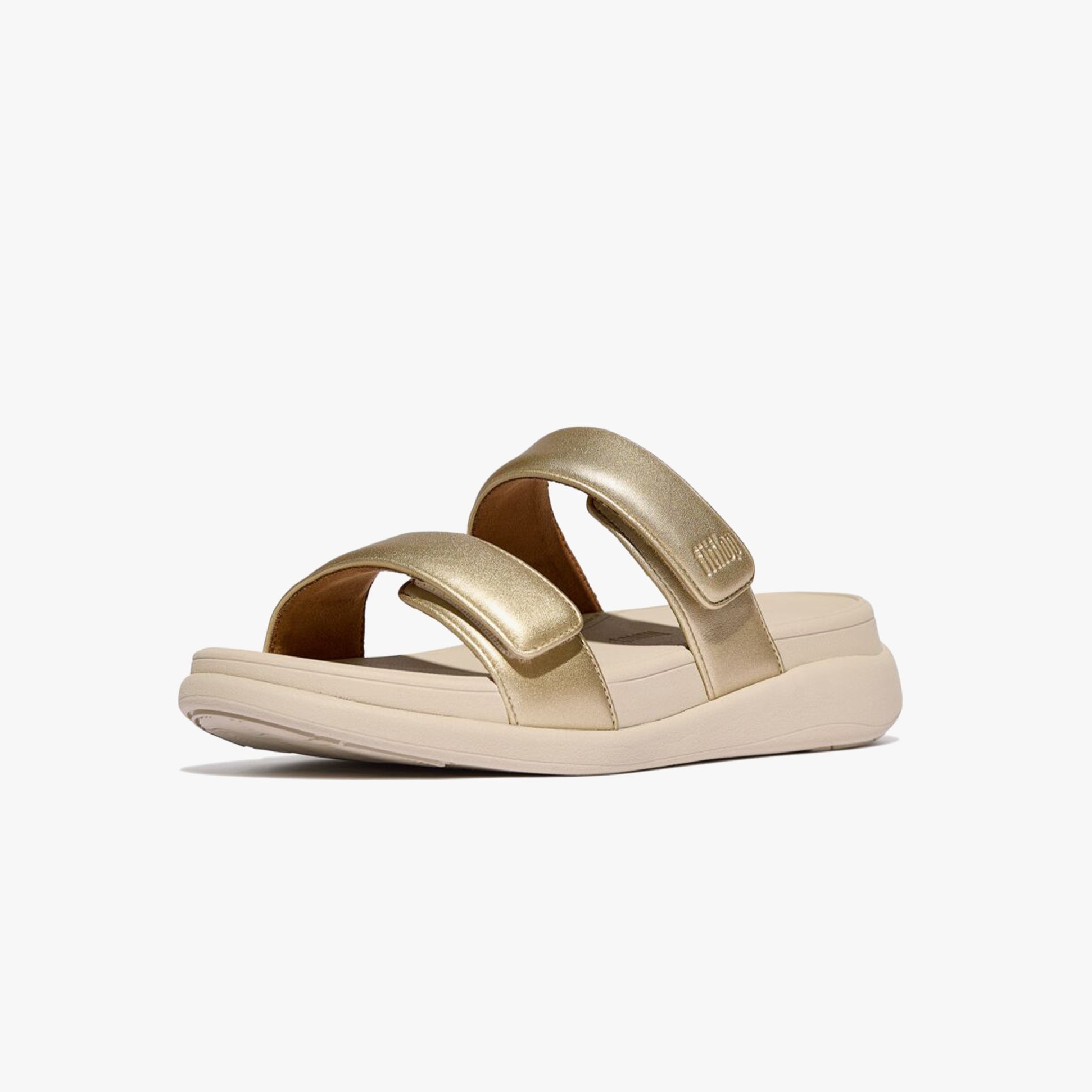 FitFlop F-MODE GO Womens Slides Platino side view showing the gold leather upper and comfortable slip-on design.