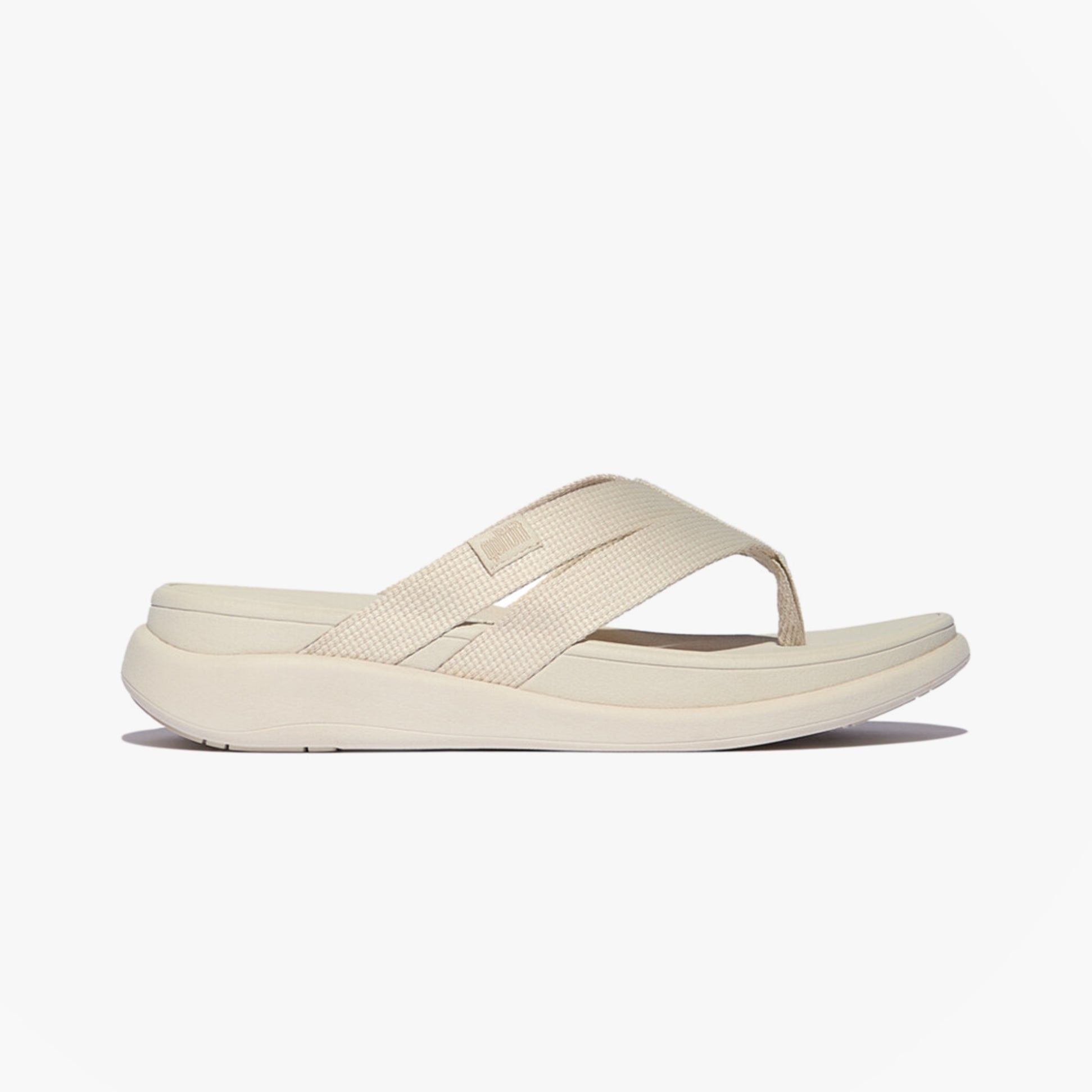 FitFlop F-MODE GO Womens Flip Flops Paris Beige side view showing comfortable slip-on design and rubber sole.