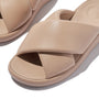 FitFlop iQUSHION D-LUXE Womens Slides Classic Beige top view showcasing the soft leather upper and slip-on design.