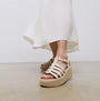 FitFlop PLATFFORMS ESPADRILLE Womens Wedge Sandals Paris Beige side view with a model wearing a flowing white dress.