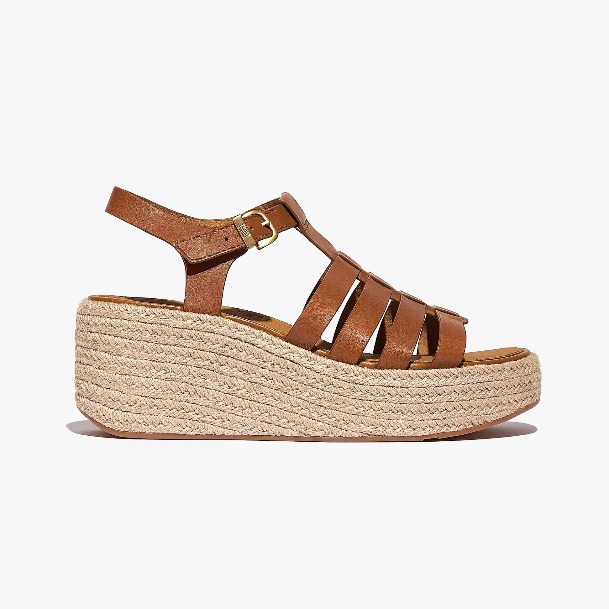 FitFlop PLATFFORMS ESPADRILLE Womens Wedge Sandals Deep Tan side view showing leather upper and woven wedge.