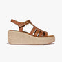 FitFlop PLATFFORMS ESPADRILLE Womens Wedge Sandals Deep Tan side view showing leather upper and woven wedge.