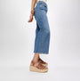 FitFlop PLATFFORMS ESPADRILLE Womens Wedge Sandals Deep Tan side view paired with jeans on a light background.