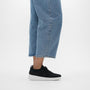 FitFlop SUPER-Q KNIT Womens Trainers Black side view worn with denim jeans