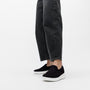 FitFlop SUPER-Q KNIT Womens Trainers Black side view worn with jeans